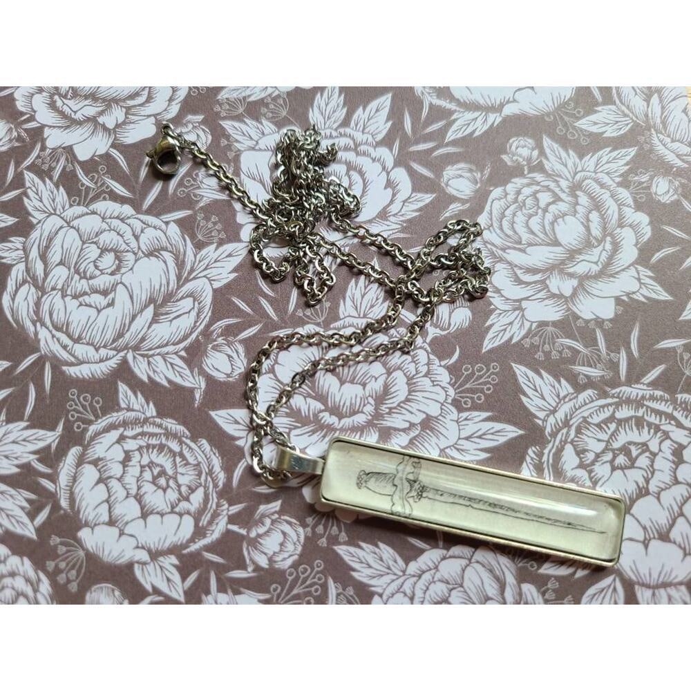Nightfell pendant necklace made with The Cruel Prince book pages